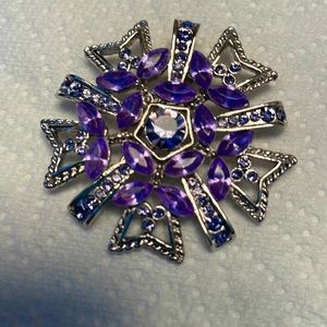 Purple and silver brooch or pin